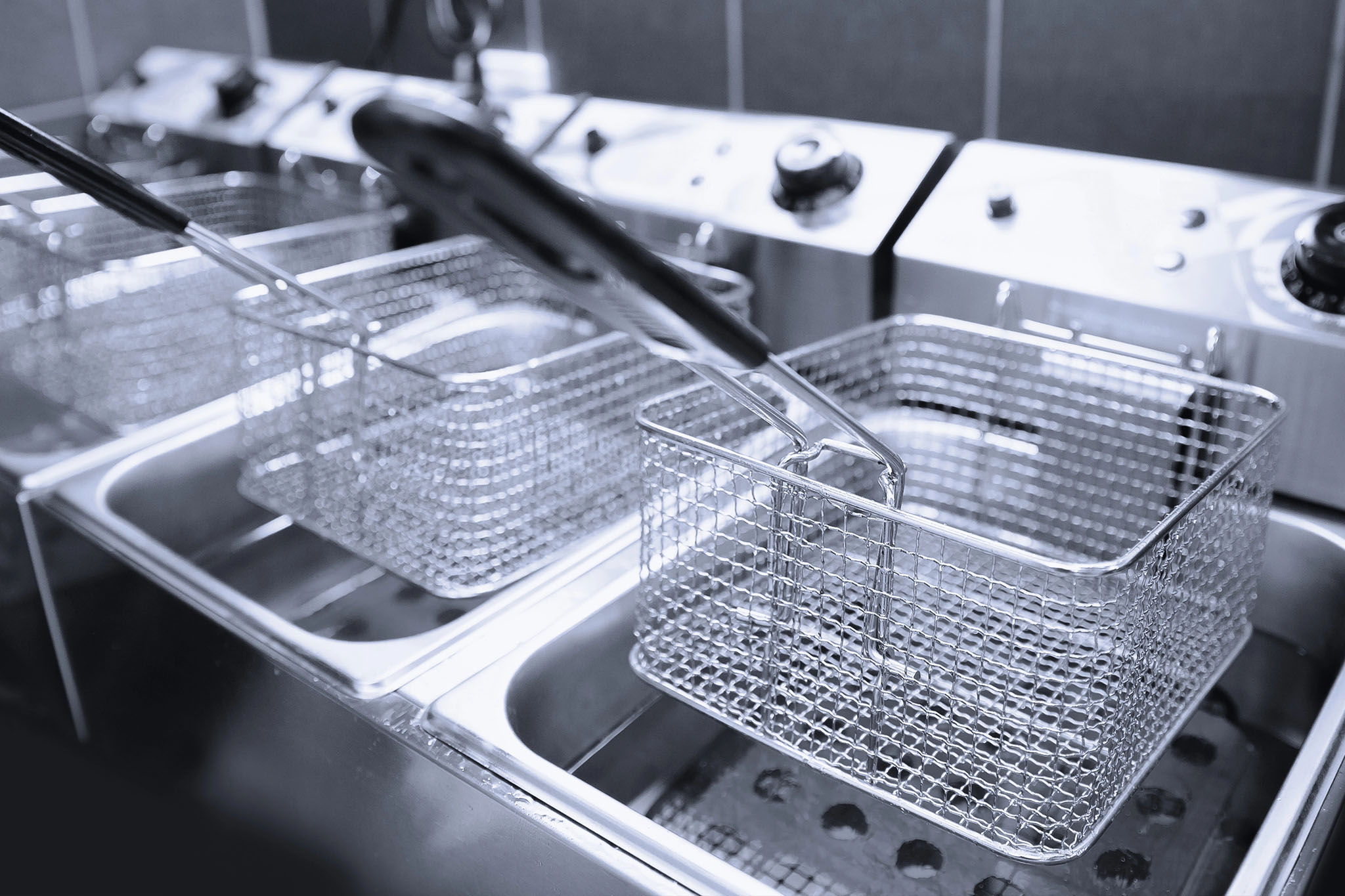 commercial deep fryer baskets and kitchen equipment prepared for dry ice blasting cleaning